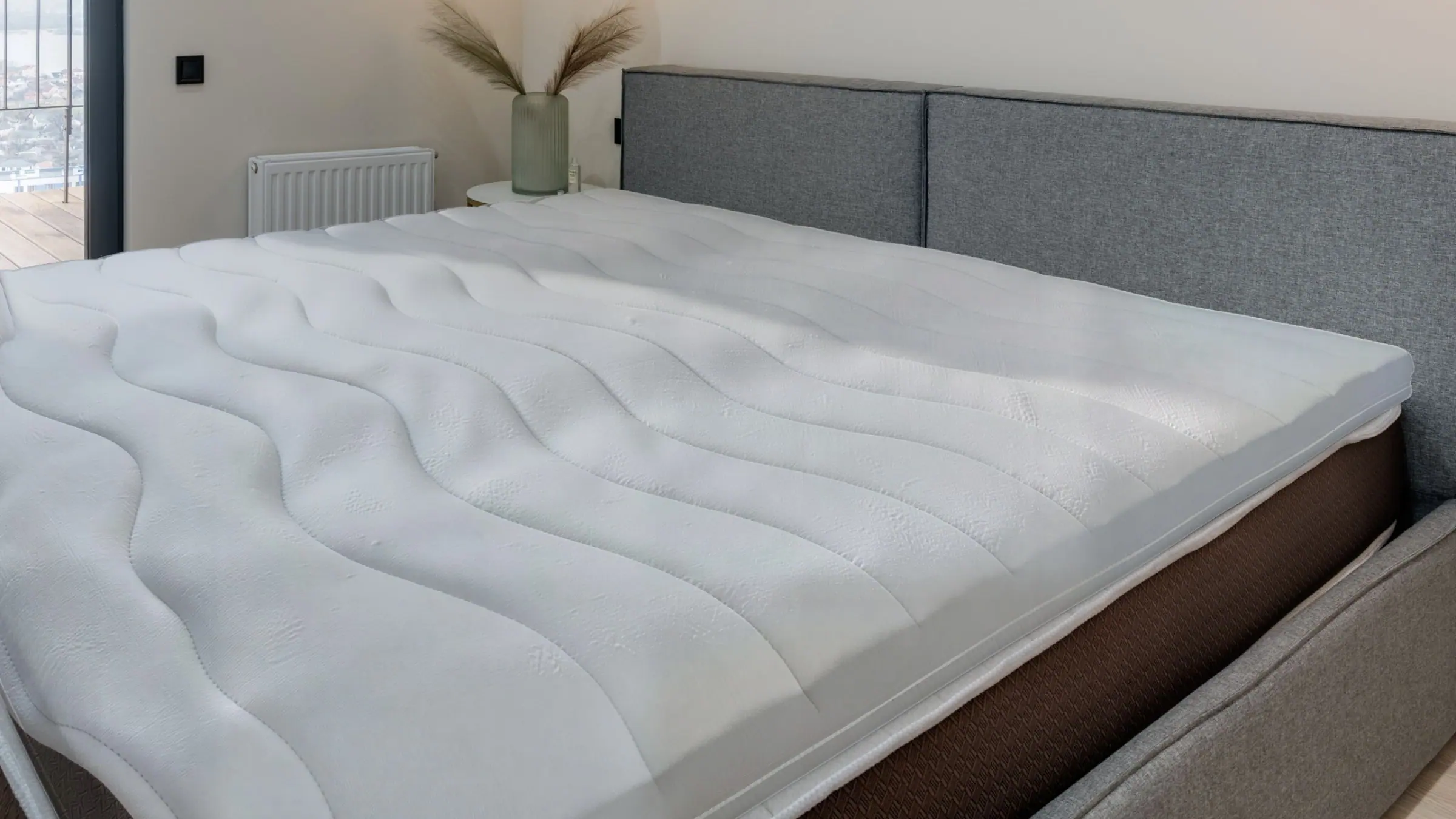 Topper van Toros Bedden op een matras, van dichtbij